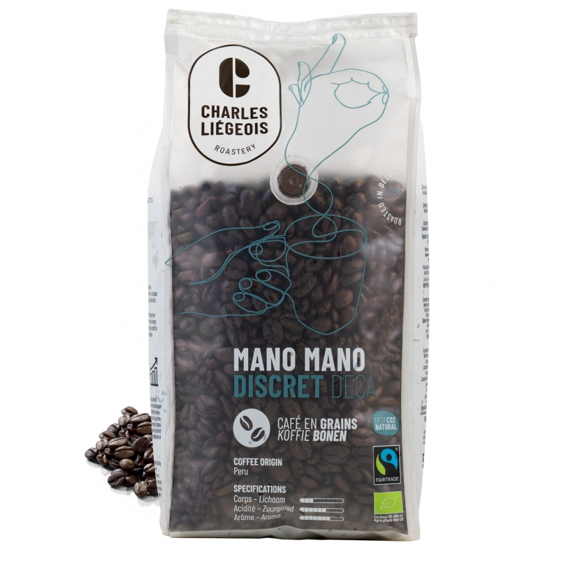 Paquet de café en grains bio, Fairtrade et décaféiné Mano Mano 500g de Charles Liégeois, mélange discret et léger.